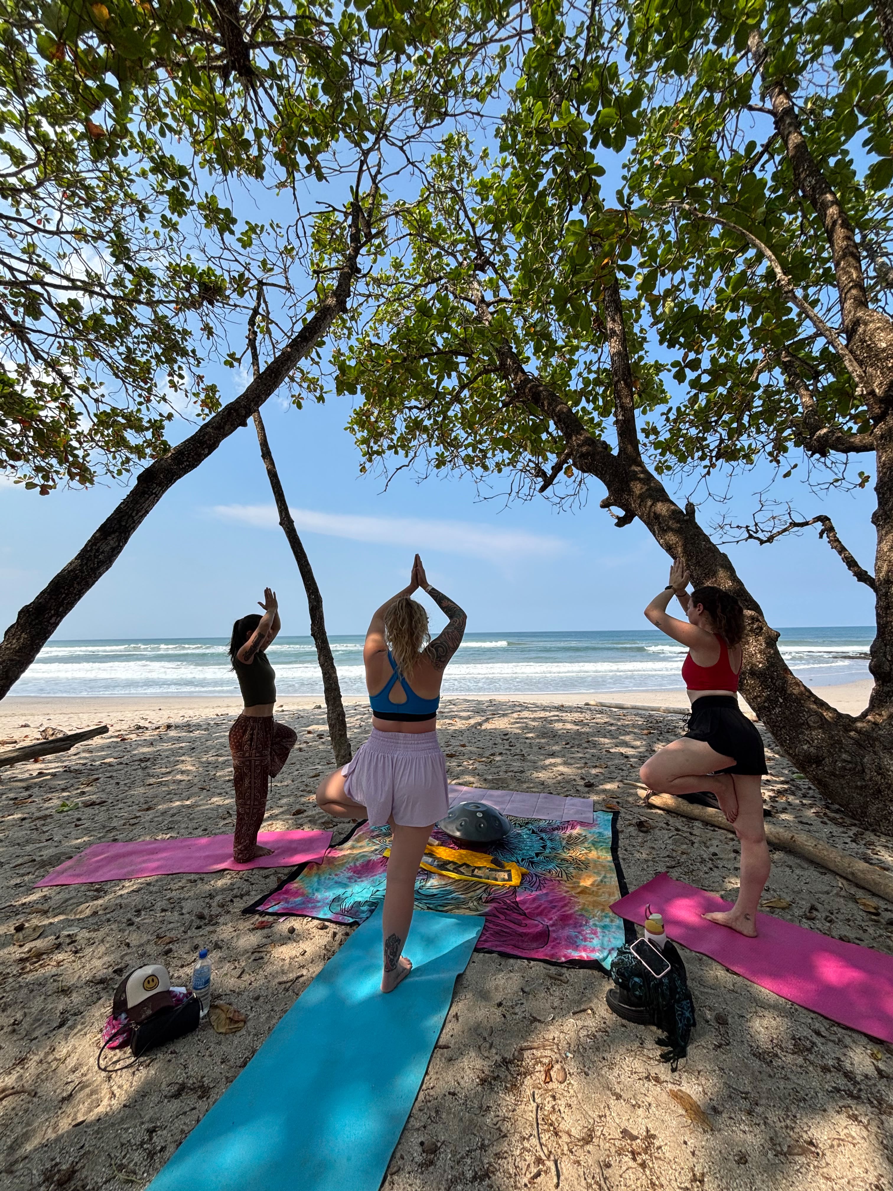 Beach yoga session in Santa Teresa